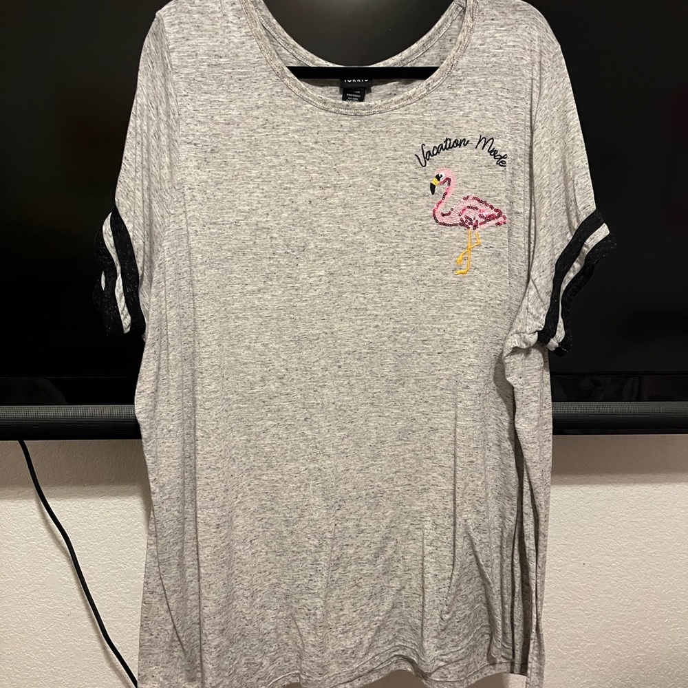Torrid size 5 thin material T-shirt. Very soft. Like new but has been worn.